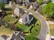 Aerial view featuring the manicured yards, mature trees, and manicured landscaping at 341 Declaire Ne Way, Marietta, GA 30067