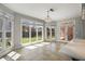 Dining area with tile floors, a chandelier, and a view of the backyard at 341 Declaire Ne Way, Marietta, GA 30067