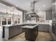Updated kitchen with stainless steel appliances, center island, and custom cabinetry at 341 Declaire Ne Way, Marietta, GA 30067