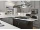 Well-equipped kitchen features stainless appliances, stylish cabinetry, and center island at 341 Declaire Ne Way, Marietta, GA 30067