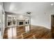 Bright living room with hardwood floors, large windows, and a cozy stone fireplace at 341 Declaire Ne Way, Marietta, GA 30067