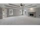Spacious main bedroom features a tray ceiling, fireplace, and access to ensuite bathroom at 341 Declaire Ne Way, Marietta, GA 30067