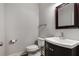 Convenient powder room with elegant fixtures and modern vanity at 341 Declaire Ne Way, Marietta, GA 30067