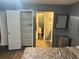 Bedroom area featuring a closet and entrance to bathroom at 3518 Shepherds Path, Decatur, GA 30034