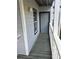 Apartment front door and small outdoor porch area with safety light at 3518 Shepherds Path, Decatur, GA 30034