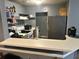 Compact kitchen features white countertops and stainless steel appliances at 3518 Shepherds Path, Decatur, GA 30034