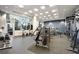 Well-equipped fitness center with modern exercise equipment and floor to ceiling windows at 1080 Peachtree Ne St # 1504, Atlanta, GA 30309