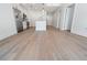 Spacious open floor plan with a kitchen and hardwood floors, creating a modern and inviting living space at 1080 Peachtree Ne St # 1504, Atlanta, GA 30309