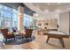 Resident lounge with floor-to-ceiling windows, comfortable seating, and a billiards table at 1080 Peachtree Ne St # 1504, Atlanta, GA 30309