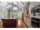 Gourmet kitchen showcases a large island, custom cabinets, and stainless steel appliances at 1127 Bank Se St, Smyrna, GA 30080