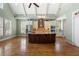 Spacious kitchen features vaulted ceilings, center island, custom cabinetry, and stainless appliances at 1127 Bank Se St, Smyrna, GA 30080
