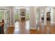 Open living room design featuring hardwood floors, fireplace, and natural light throughout at 1127 Bank Se St, Smyrna, GA 30080
