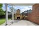 An outdoor brick patio featuring a stone fireplace, perfect for entertaining at 1127 Bank Se St, Smyrna, GA 30080