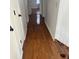 Hallway with new hardwood flooring and fresh paint at 4149 Silver Hill Ct, Snellville, GA 30039