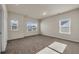 Bedroom with neutral carpet, large windows and plenty of natural light at 5140 Woodline View Cir, Auburn, GA 30011