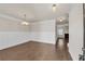 Spacious dining room with hardwood floors, chandelier, and decorative wall trim at 5140 Woodline View Cir, Auburn, GA 30011