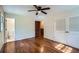 Bedroom with hardwood floors, and ensuite bathroom at 6435 E Glen Rd, Lithonia, GA 30038