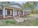 Close up of the front porch showing white columns and brick facade at 6435 E Glen Rd, Lithonia, GA 30038