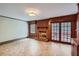 Spacious living room featuring a brick fireplace, and tile floors at 6435 E Glen Rd, Lithonia, GA 30038