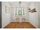 Dining area features a stylish chandelier and view to the backyard at 307 Downing Creek Trl, Canton, GA 30114