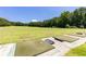 Practice your swing at the golf driving range with multiple hitting stations and open space at 307 Downing Creek Trl, Canton, GA 30114