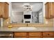 View of the living room from the kitchen countertop and sink area at 307 Downing Creek Trl, Canton, GA 30114