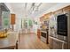 Kitchen featuring stainless steel appliances, a stone countertop and backsplash at 307 Downing Creek Trl, Canton, GA 30114