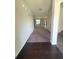 Inviting entryway with hardwood floors transitioning to plush carpeting, creating a warm welcome at 5243 Cantbury Way, Atlanta, GA 30349