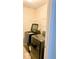 Laundry room with modern front-load washer and dryer, plus overhead shelving at 5243 Cantbury Way, Atlanta, GA 30349