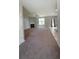 Spacious living room featuring a cozy fireplace, neutral color palette, and an open layout at 5243 Cantbury Way, Atlanta, GA 30349