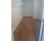 A carpeted walk-in closet with a shelf offers storage space at 5243 Cantbury Way, Atlanta, GA 30349