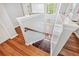 Beautiful staircase featuring hardwood floors and modern design at 642 Towering Pine Trl, Lawrenceville, GA 30045