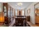 Formal dining room showcasing ample natural light, and space for a large china cabinet at 726 Fir Chase, Fairburn, GA 30213