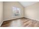 Neutral bedroom with hardwood floors, a vaulted ceiling, and lots of natural light at 902 Brumley Nw Ln, Kennesaw, GA 30152