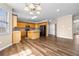 Bright kitchen with an island, wooden cabinets, and an open floor plan at 902 Brumley Nw Ln, Kennesaw, GA 30152