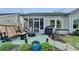 Charming patio with seating, grill, and landscaped surroundings, ideal for outdoor entertaining at 230 Hickory Chase, Canton, GA 30115