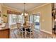 Cozy dining room with a view of the backyard, perfect for intimate gatherings at 230 Hickory Chase, Canton, GA 30115