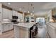 Kitchen with center island, seating, stainless appliances and an open floorplan at 230 Hickory Chase, Canton, GA 30115