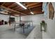 Spacious basement with ping pong table and open ceiling at 2449 Fraser Rd, Marietta, GA 30066