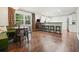 Eat-in kitchen with breakfast bar, hardwood floors, and a view to the backyard at 2449 Fraser Rd, Marietta, GA 30066