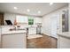 Updated kitchen with white cabinets, granite countertops, stainless appliances, and a modern design at 2449 Fraser Rd, Marietta, GA 30066