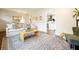 Bright living room featuring natural light, hardwood floors, and a comfortable sofa at 2449 Fraser Rd, Marietta, GA 30066