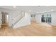 Spacious basement with light wood floors, white walls, and a walkout to the backyard at 330 Spring Lake Ter, Roswell, GA 30076