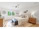 Bright bedroom with a decorative wall, large bed, and windows at 330 Spring Lake Ter, Roswell, GA 30076