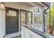 Inviting front entrance with a modern door and decorative windows at 330 Spring Lake Ter, Roswell, GA 30076