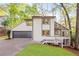 Charming home featuring a well-maintained yard and attached garage at 330 Spring Lake Ter, Roswell, GA 30076