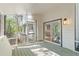 Screened porch with views of the surrounding trees and outdoor space at 330 Spring Lake Ter, Roswell, GA 30076