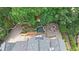 This overhead view shows the water feature, firepit area, patio, and roof of this home at 3915 Merriweather Woods, Johns Creek, GA 30022