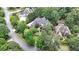 Gorgeous aerial view of home highlighting its landscaped surroundings and neighborhood in a desirable location at 3915 Merriweather Woods, Johns Creek, GA 30022