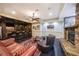 Finished basement boasts a wet bar, stone fireplace, and comfortable seating for entertaining at 3915 Merriweather Woods, Johns Creek, GA 30022